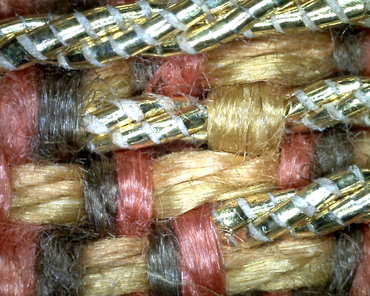 Mikroskopbillede af de oplukkede cordonnet guldtråde